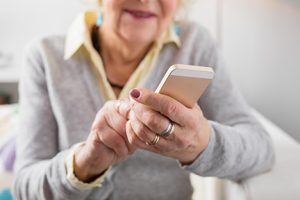 Senior citizen using a smart phone