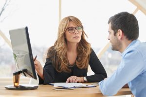 Image of a professional woman giving financial advice