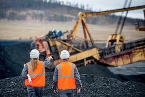 Image of two coal miners at work