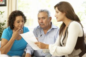 Image of a senior couple reviewing their asset allocation