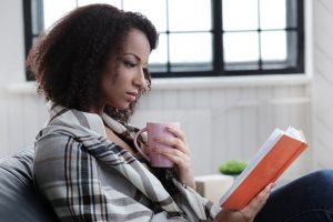 Image of a young woman reading