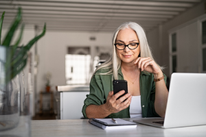 Image of a senior woman using technology