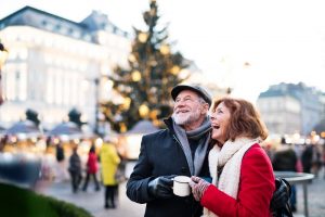 Image of a senior couple at a Christmas market