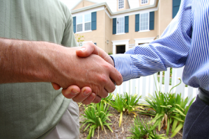 Image of a handshake, representing a real estate deal