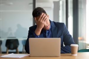 Image of a stressed businessman