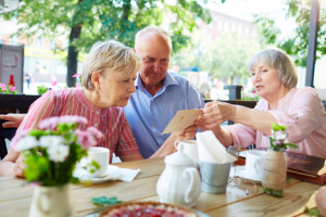 Image of seniors discussing bond investing