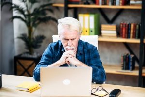 Image of a thoughtful senior man