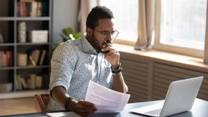 Image of a businessman doing research