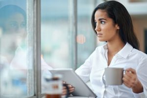 Image of a young businesswoman using a tablet