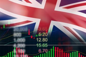 Image of a British flag hanging over a stock chart