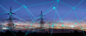 Image of electricity poles overlooking a city