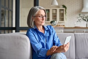 Image of a senior woman using her tablet