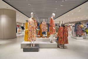 Image of a Zara store interior with mannequins in dresses