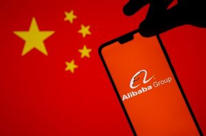 Image of Alibaba logo on a smartphone symbolizing Chinese tech stocks