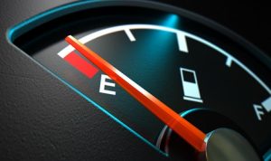 Image of gas gauge on “E” representing energy shortage