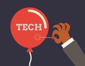 Image of a balloon labeled "tech" getting popped by a pin