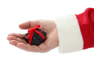 Image of Santa handing out a lump of coal