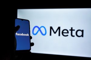 Image of Facebook’s Logo Beside Meta’s Logo