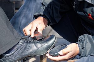 Image of a shoeshine boy working