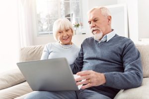 Image of excited elderly investors