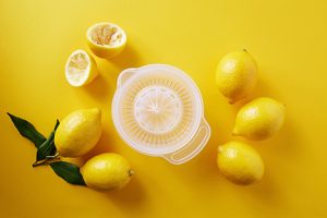 Image of lemons beside squeezer