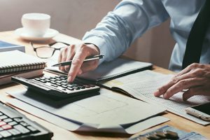 Image of a businessman working at a desk