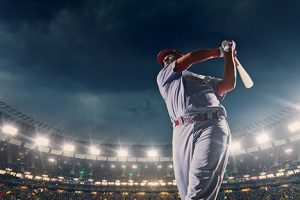 Baseball player swinging bat