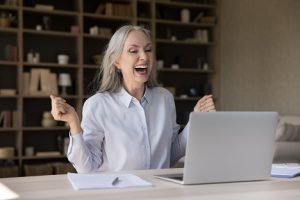 Image of a happy elderly investor