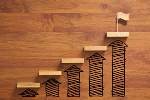 Wooden staircase depicting reaching goal and success