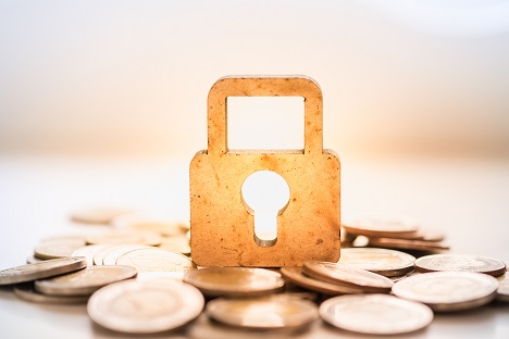 Image of a lock and a pile of coins