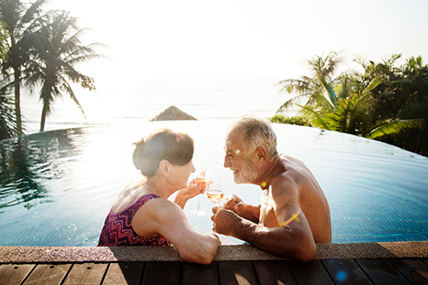 Image of an elderly couple in a pool
