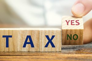 Tax concept with yes or no blocks