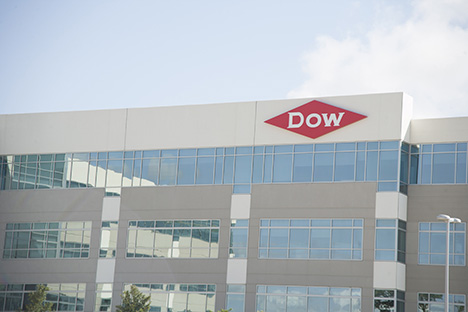 Image of a the Dow logo on the side of the building