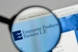 Enterprise Products Partners logo under a magnifying glass