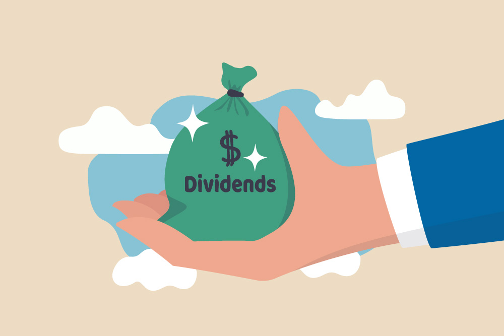 Image of a hand holding a bag of cash that says "dividends"