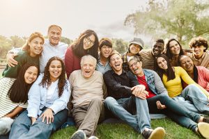 A diverse group of people smiling together