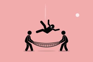 Two people holding a safety net to catch someone falling