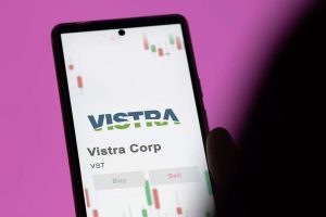 A smartphone showing the Vistra logo