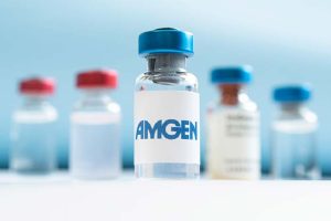 The Amgen logo on a vial of medicine