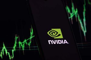 The Nvidia logo in front of a rising stock chart