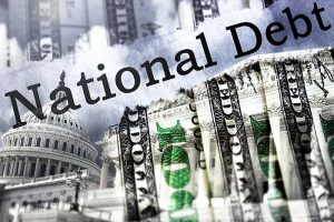 The words “national debt” next to a U.S. dollar bill and the Capitol building