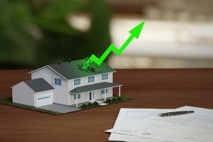 A green “up” arrow breaking through the roof of a two-story home