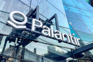 The Palantir logo on the front of a building