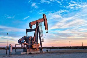 A pump jack in an oil field