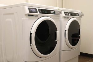 A pair of Maytag washing machines