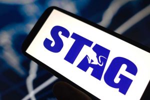 The Stag Industrial logo on a smartphone
