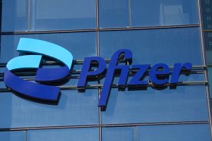 The Pfizer logo on the side of a building