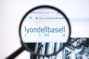 The logo for LyondellBasell Industries under a magnifying class