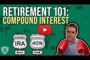 Oxford Club Chief Income Strategist Marc Lichtenfeld wearing a pair of boxing gloves