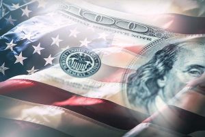 A collage of an American flag and a U.S. dollar bill